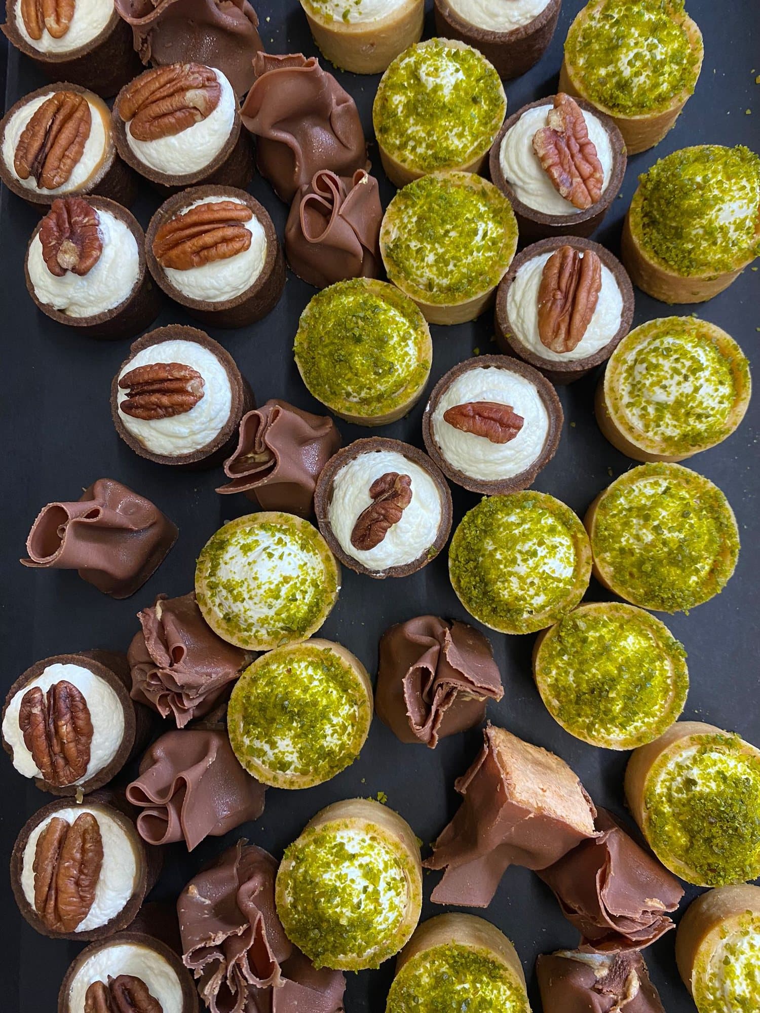 Pistachio, pecan & chocolate tartlets